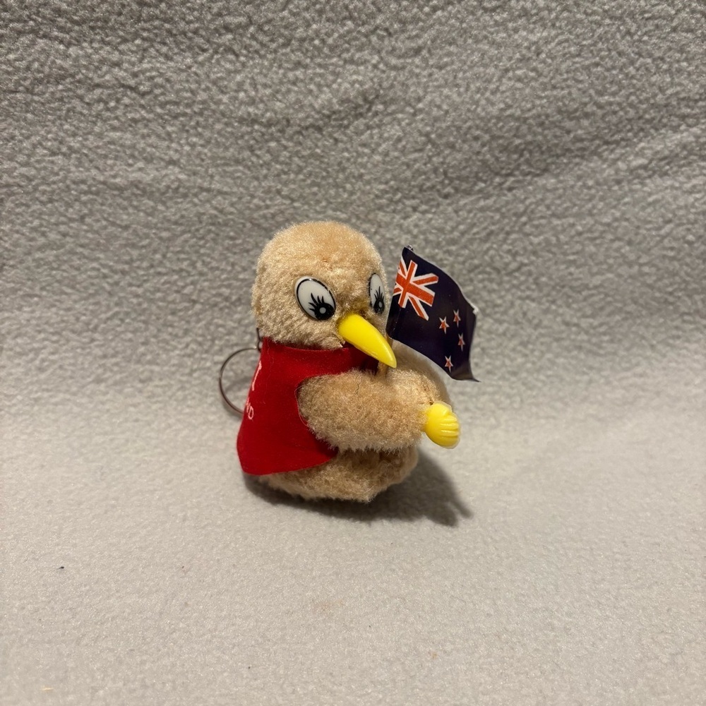 Vintage Kiwi Bird Mini Souvenir Plush Toy Key Chain holding New Zealand Flag